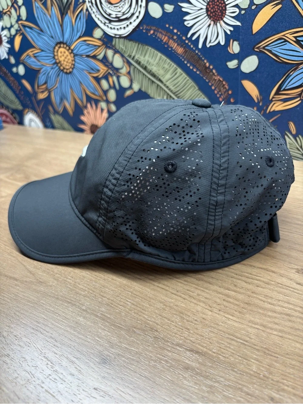 Nike Women's Perdorated Black Cap with White Swoosh